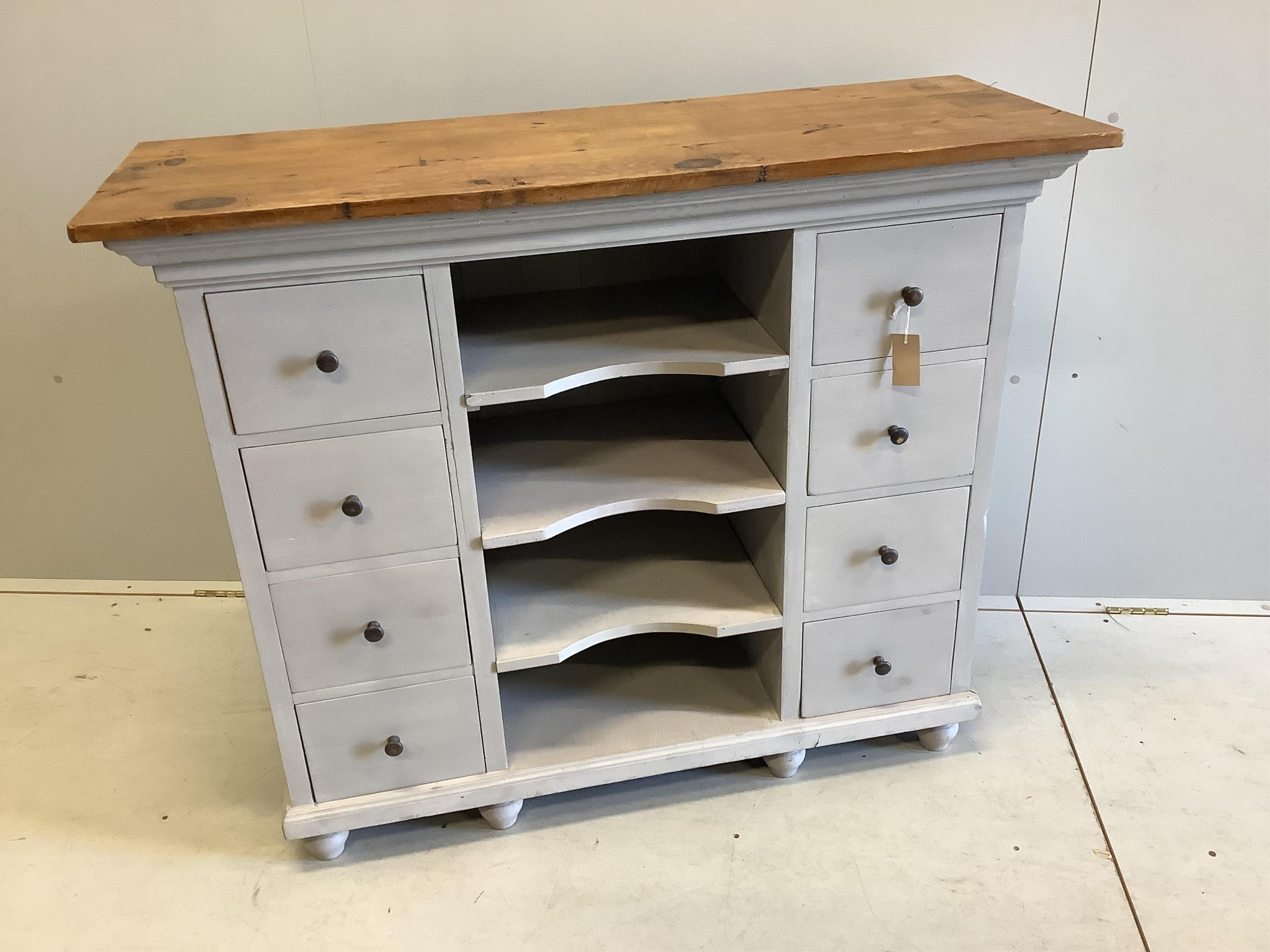 A painted pine eight drawer side cabinet, width 116cm, depth 43cm, height 97cm. Condition - fair to good